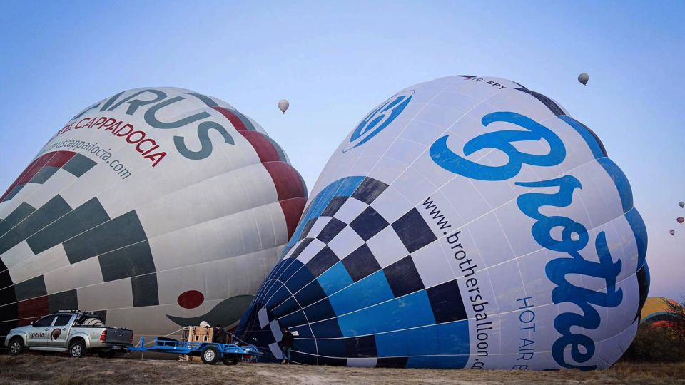 Cappadocia: Balloon Sunrise Flight Economic-Premium Options - The launch scene: Snacks, bonfire warmth, and watching balloons wake up