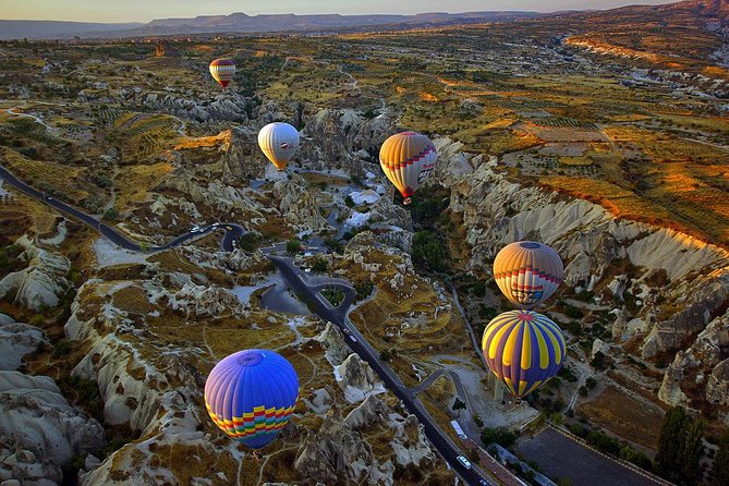 Cappadocia Hot Air Balloon Tour Over Fairychimneys - At the launch site: inflating balloons and clear safety energy