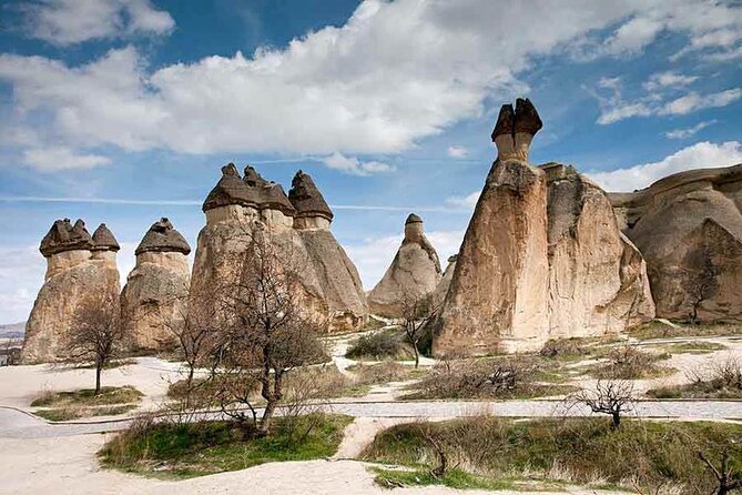 Cappadocia Red Tour With Open Air Museum And Expert Tour Guide - Urgup Stop: Twin Fairy Chimneys and the Classic Symbol